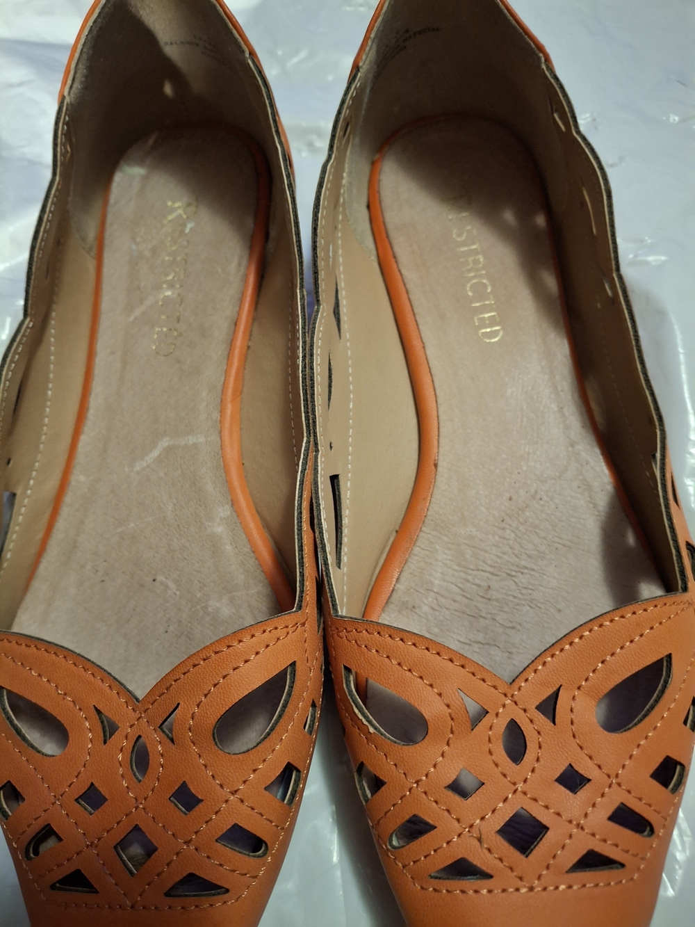 Restricted Orange Laser-Cut Pointed Toe Flats